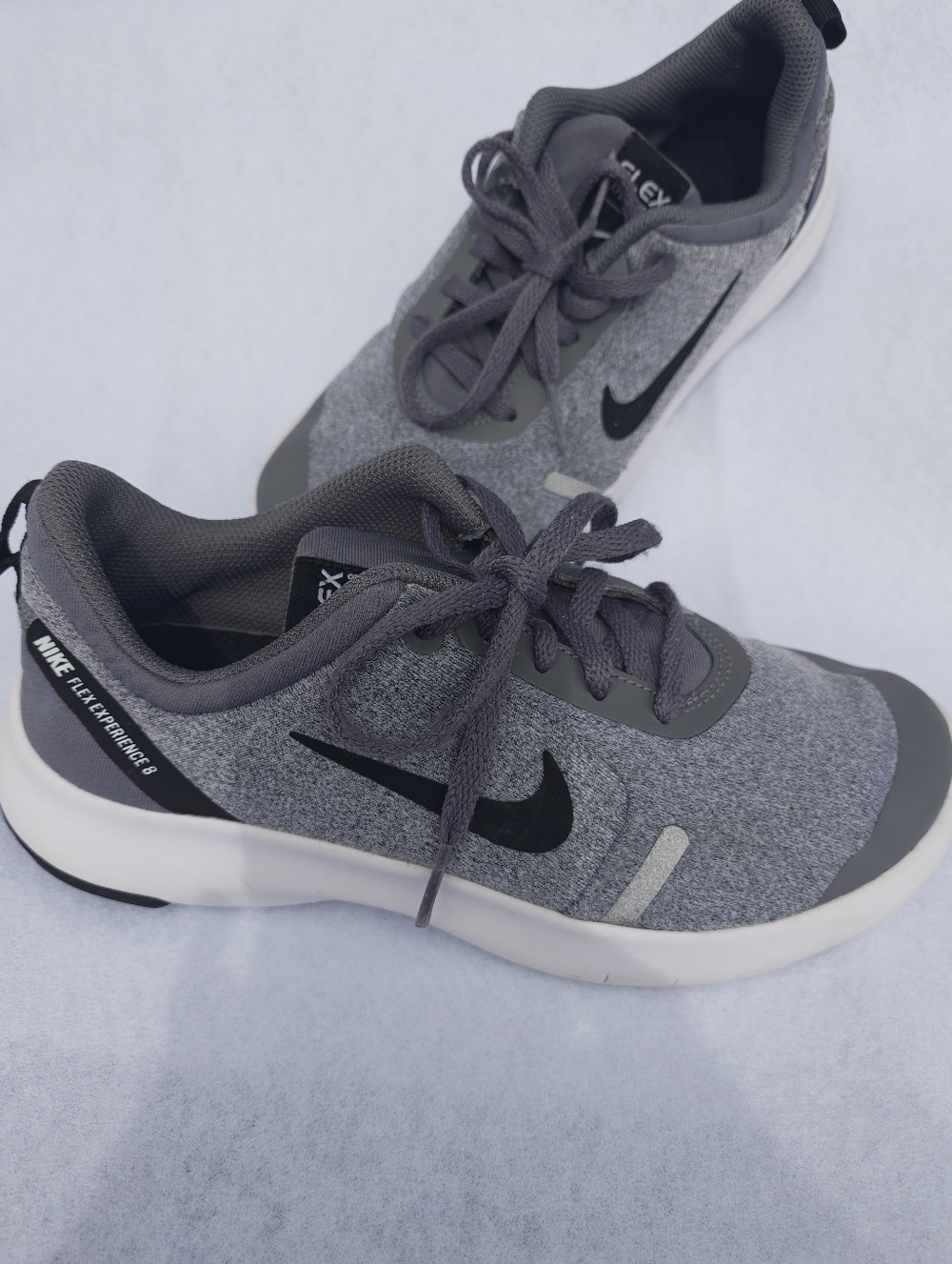 Nike Gray Athletic Sneakers with Black Swoosh